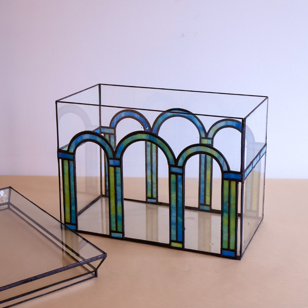Six arch design with blue/green glass