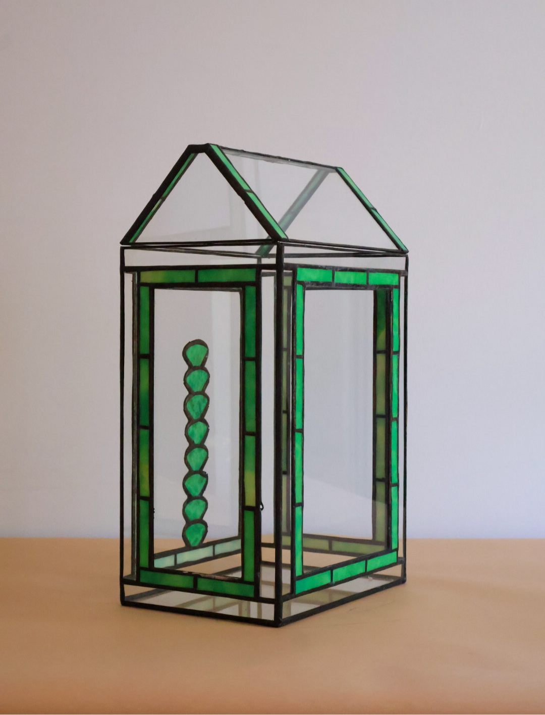 Stained glass terrarium with a succulent design