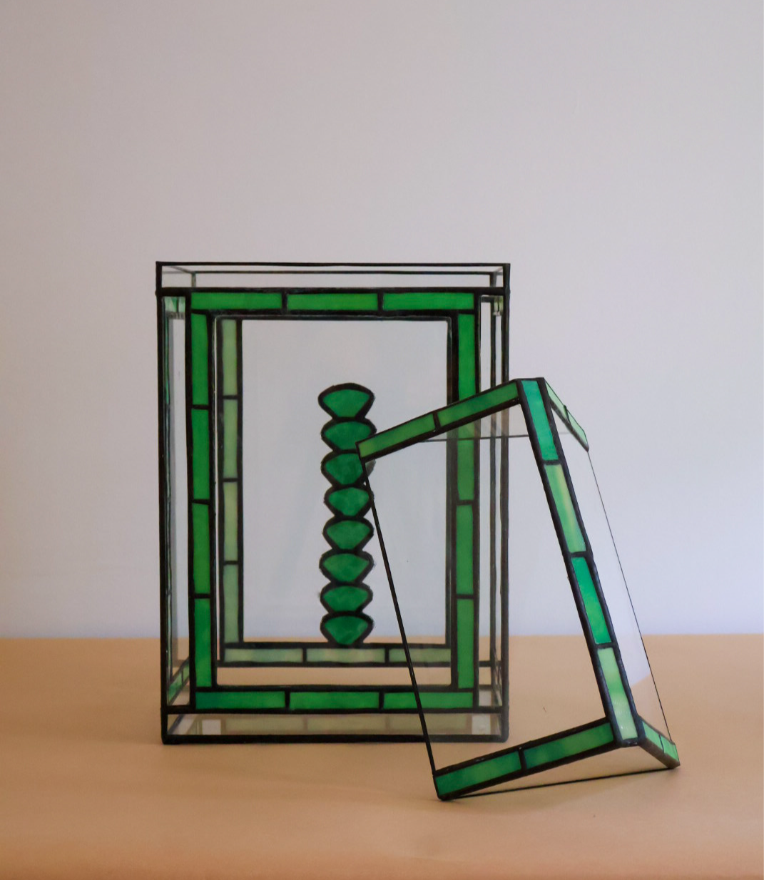 Stained glass terrarium with a succulent design