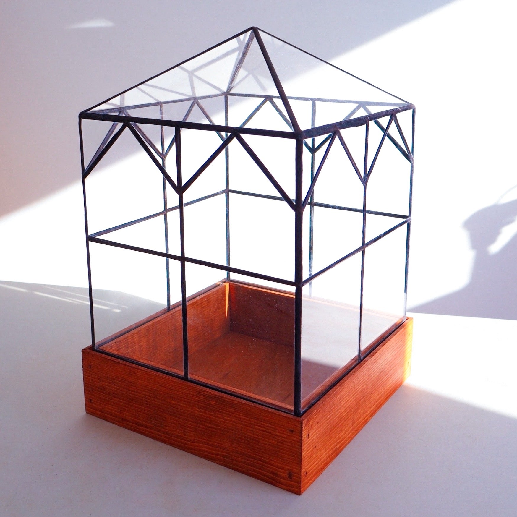 A stained glass terrarium designed and built in Michigan, USA. 
