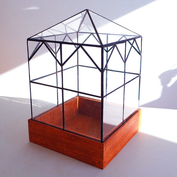 A stained glass terrarium designed and built in Michigan, USA. 